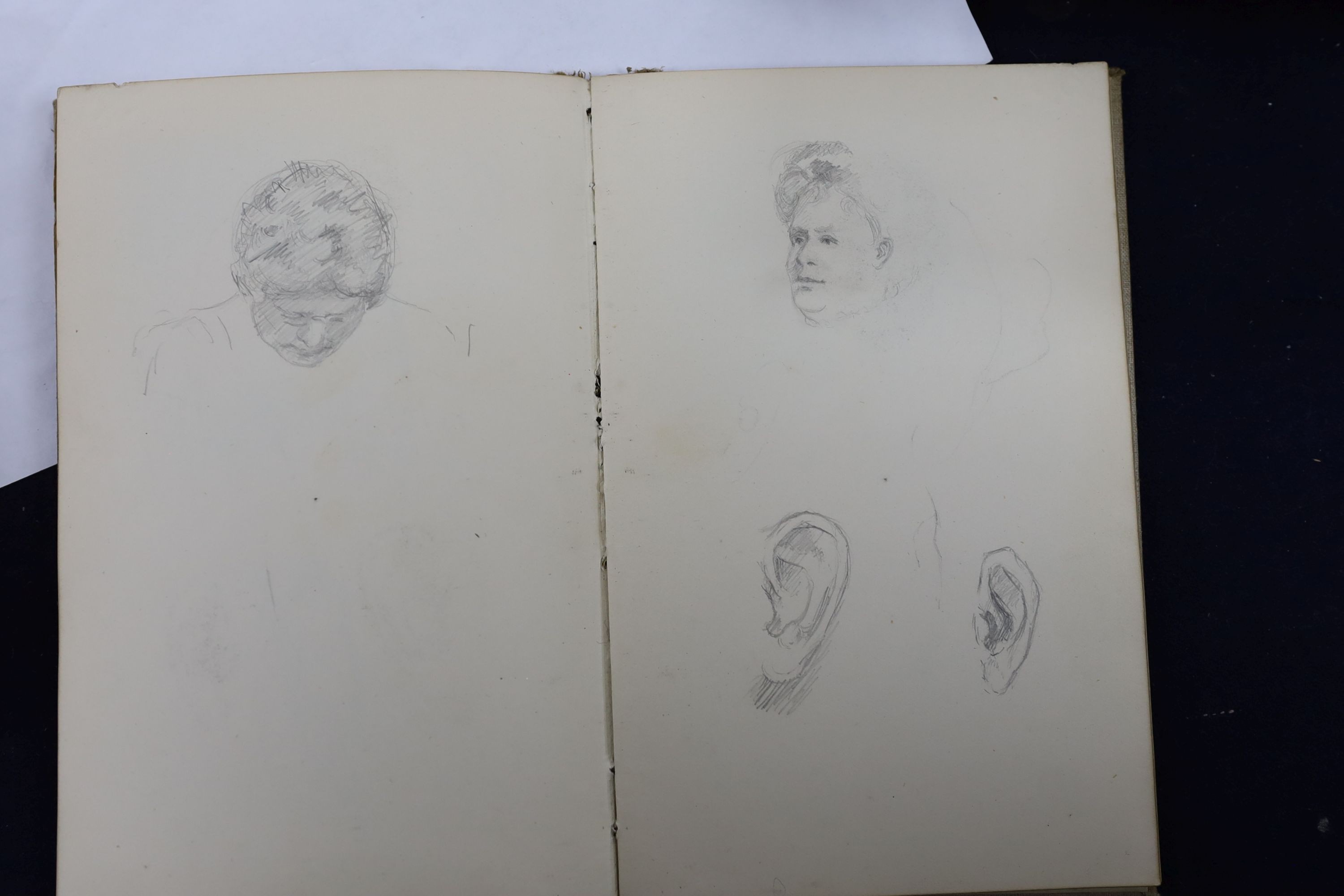 Five various sketch books, an exercise book containing miscellaneous crests and a photograph album